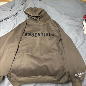 Essentials hoodie it’s a greenish